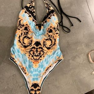 Swim dress Size M but small, low-cut (front and back)